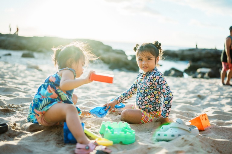 Two toddler girls playing
