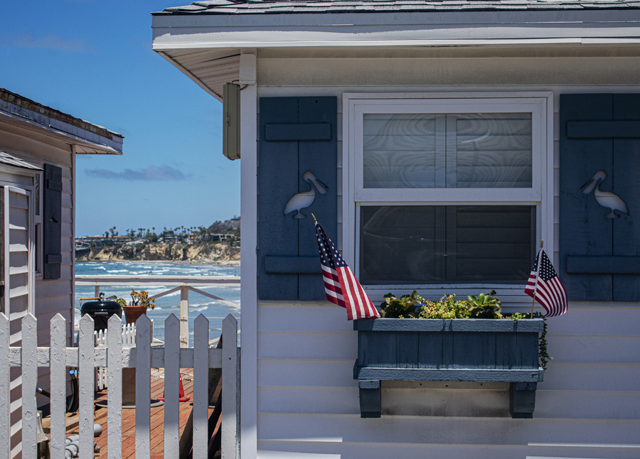 White and Blue Cottage on a Pier 4th of July.